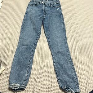 Criss cross skinny ankle high rise jeans